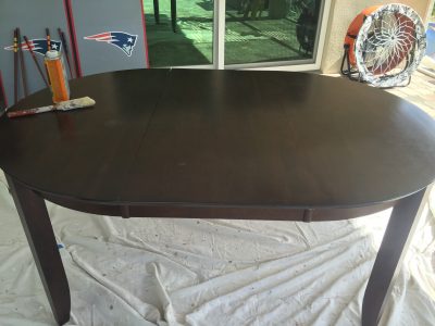 Dark wood table, before paint stripper
