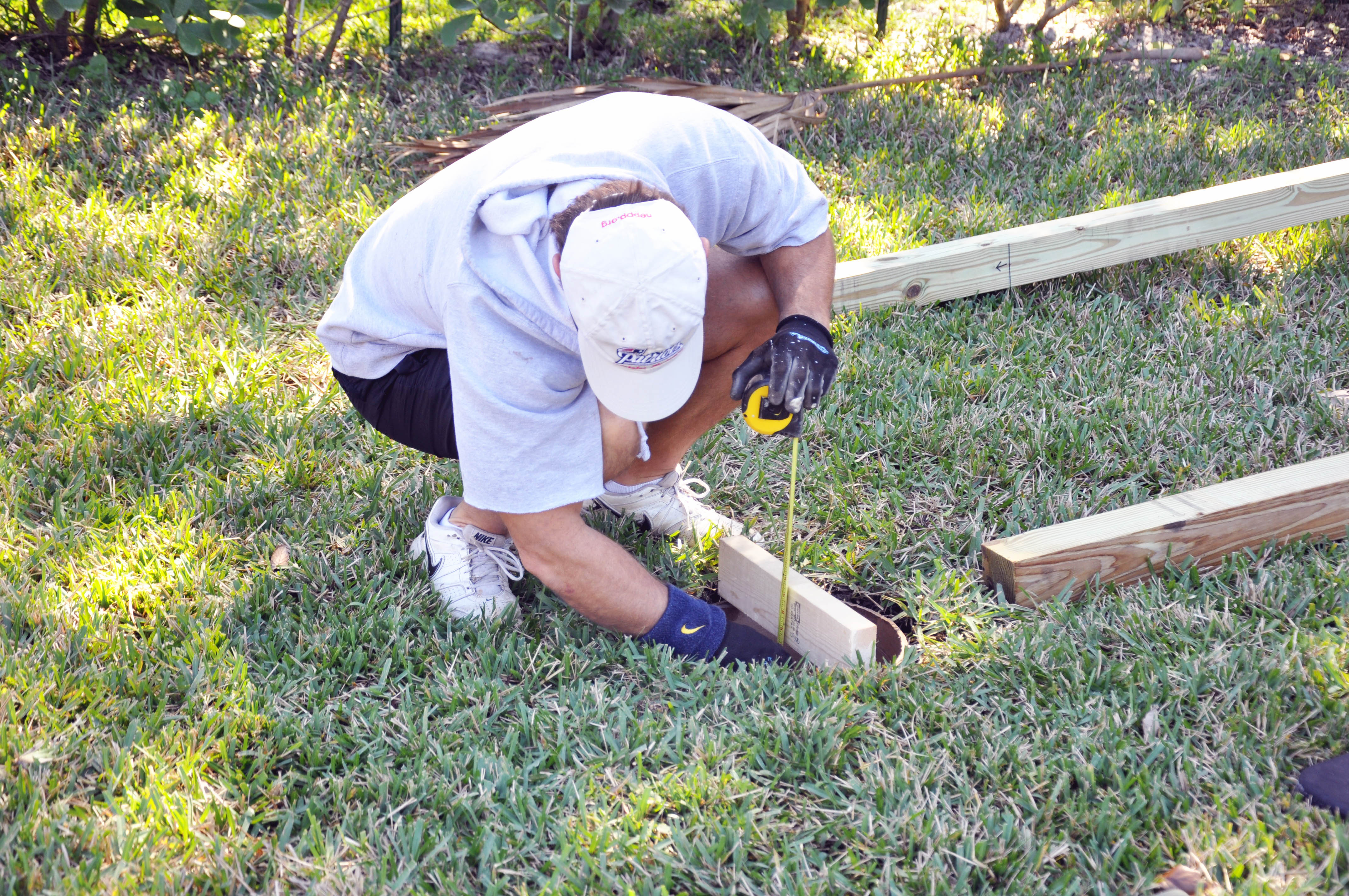 Measuring to see how high we need to put the concrete.